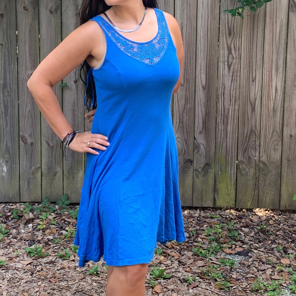 Sleeveless dress with a twirly skirt